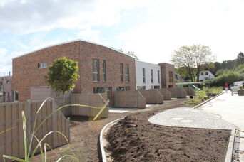 Neubau eines Mehrfamilienhauses mit 35 WE und 18 Reihenhäusern in Scharbeutz <br>Bauzeit: 2016-2017 <br>Leistungsspektrum: HOAI Phase: 1-9