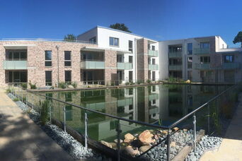 Neubau eines Mehrfamilienhauses mit 35 WE und 18 Reihenhäusern in Scharbeutz <br>Bauzeit: 2016-2017 <br>Leistungsspektrum: HOAI Phase: 1-9